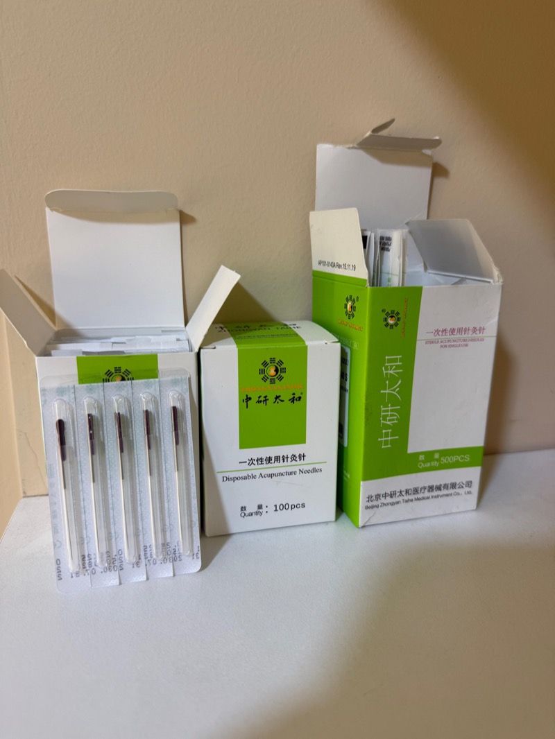 Boxes of sterile single-use dry needling needles